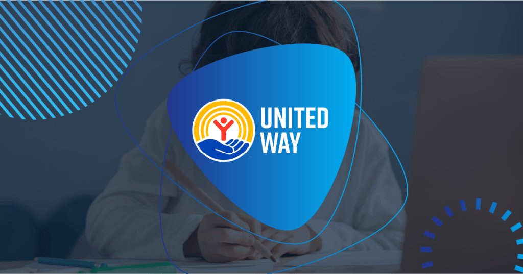 United Way logo overlaid on a background of a child writing at a desk with a laptop, representing education and community support.